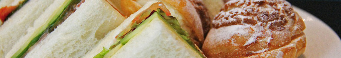 Eating Sandwich at Yummy Deli restaurant in Everett, WA.